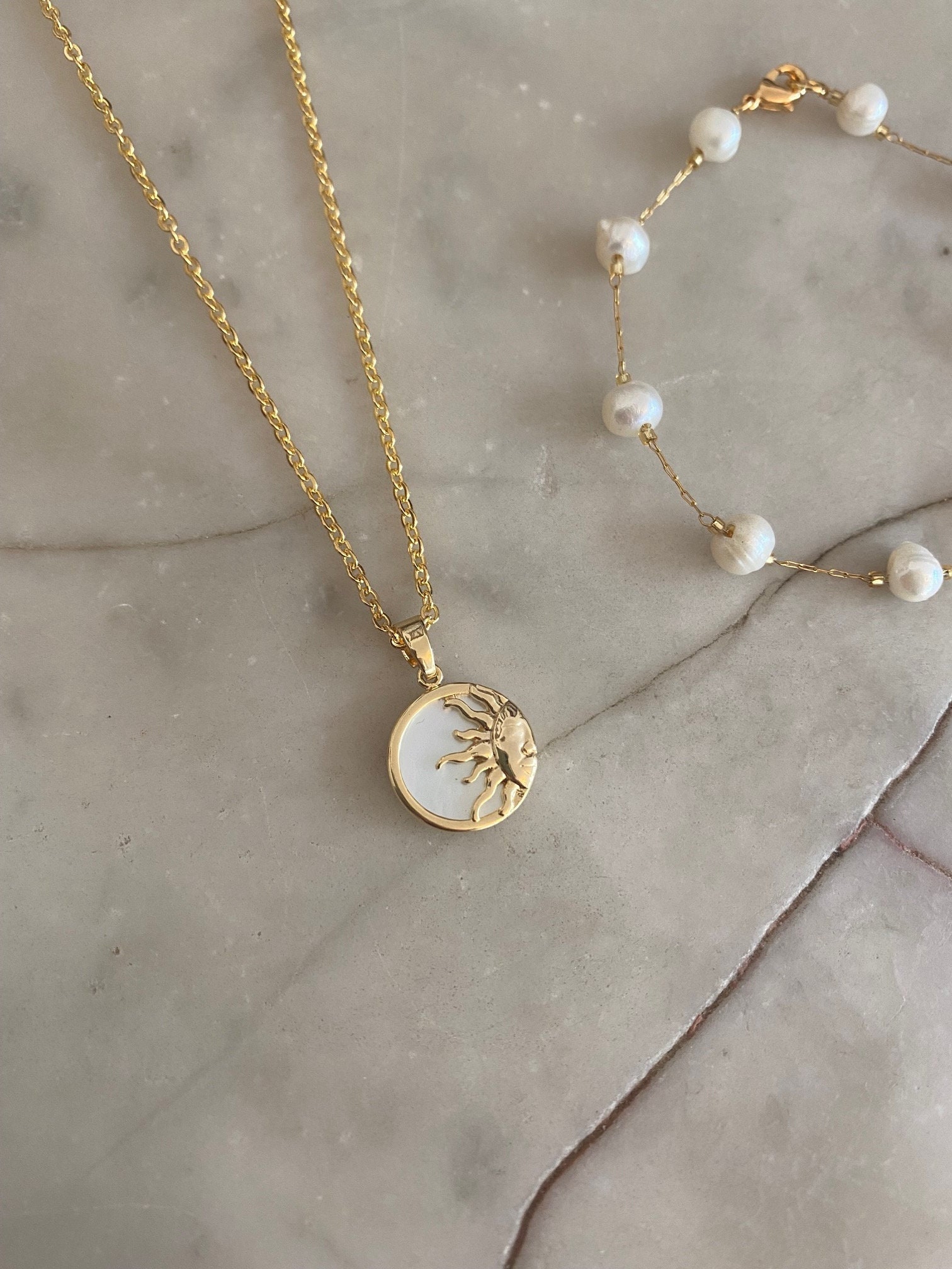 Louis Vuitton Monogram Sun And Star Jewelry Outshines With Mother-Of-Pearl  - Pursuitist