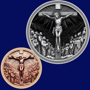 May include: Two round, framed, 3D relief sculptures depicting the crucifixion of Jesus Christ. The sculpture on the left is bronze colored and the sculpture on the right is silver colored. Both sculptures feature a crowd of people surrounding the cross.