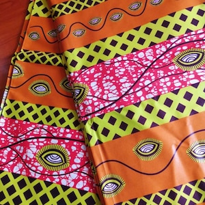 Afrikanische Ankara Augenmotiv Baumwolle Chintz Wachsdruck Stoff orange, rot und gelb Material patchwork nähen Handwerk