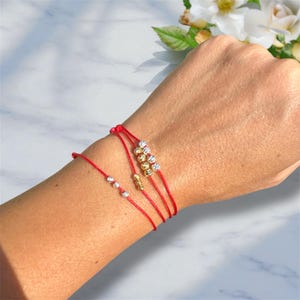 Wasserdichtes Armband Vergoldete Perlen Lucky Red String Armband Einstellbar Schwarzes Schnur Armband Passendes Armband Familie Versprechen Armband