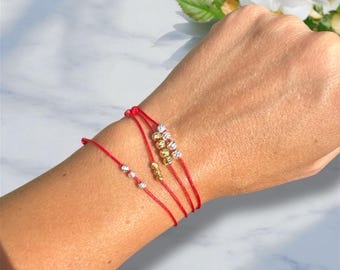 Pulsera de cuentas chapada en oro con cordón ajustable rojo de la suerte