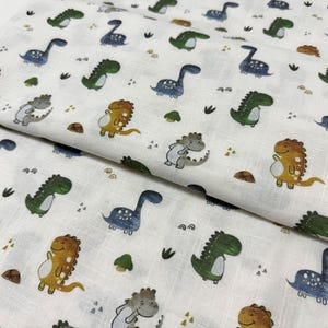 Tessuto con motivo a dinosauri colorati – Stampa personalizzata – Mussola, Popeline, Lino, Raso, Denim, Gabardine, Tessuto impermeabile – Patchwork, Quilt