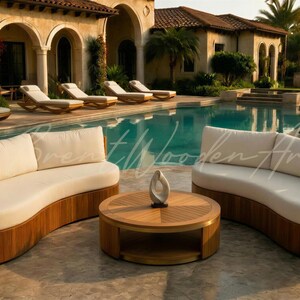 May include: Outdoor furniture set featuring two curved sofas with cream-colored cushions and a round wooden coffee table. The set is made of wood and is placed near a swimming pool. A decorative sculpture sits on the table.
