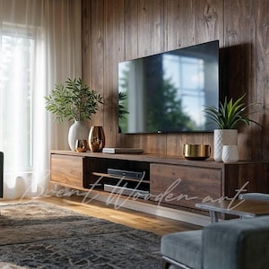Puede incluir: Un mueble de TV moderno de madera oscura con dos cajones y estanterías abiertas. Se encuentra contra una pared de paneles de madera, con un televisor de pantalla plana grande encima. Jarrones decorativos y plantas añaden elegancia.