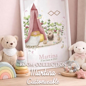 May include: A framed print featuring a pink canopy bed illustration, a hedgehog, and flowers. The print is labelled "Martina" and "Room Collection." Toys, including a teddy bear, a rainbow stacker, and a wooden toy, are arranged around the print.