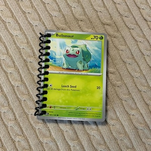 Notatnik Pokémon w oprawie spiralnej Bulbasaur z odnowionymi kartami Pokémon i 40 pustymi stronami