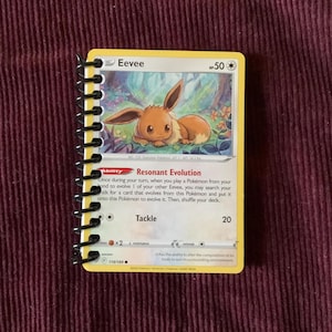 Cuaderno de espiral de Pokémon Eevee con cartas Pokémon genuinas y 40 páginas en blanco para escribir