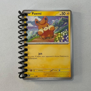 Cuaderno Pokémon Pawmi con cartas Pokémon originales y 40 páginas en blanco para escribir