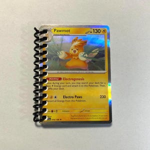 Cuaderno Pokémon Pawmot con cartas Pokémon originales y 40 páginas en blanco para escribir