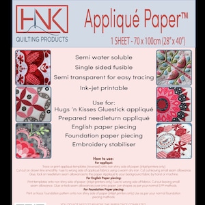 May include: A sheet of white applique paper with a red, white, and blue logo for HNK Quilting Products. The paper is semi-water soluble, single-sided fusible, semi-transparent for easy tracing, and ink-jet printable. It is 70 x 100 cm (28" x 40") and can be used for Hugs 'n Kisses Gluestick applique, prepared needleturn applique, English paper piecing, foundation paper piecing, and embroidery stabiliser.