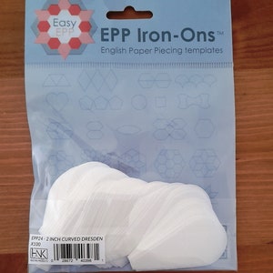 May include: A pack of 100 white 2-inch curved Dresden paper piecing templates for quilting. The pack is labelled "EPP Iron-Ons" and "Easy EPP".