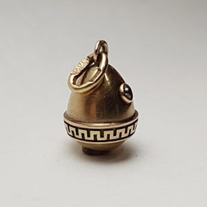 Authentic rare Faberge  gold Easter egg pendant with crystal.
