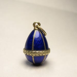 Authentic rare Faberge Easter egg pendant with blue enamel.