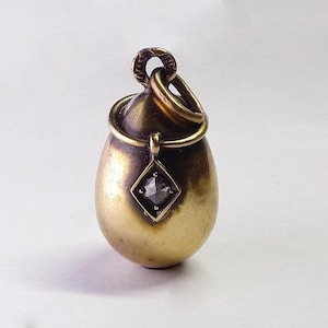 Authentic rare Faberge  gold Easter egg pendant with crystal.