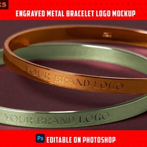 May include: Two engraved metal bangles, one gold and one green, are shown. The text "YOUR BRAND LOGO" is etched on each bangle. The image includes the text "ENGRAVED METAL BRACELET LOGO MOCKUP" and "EDITABLE ON PHOTOSHOP".