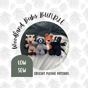 May include: Four crocheted woodland animal plushies: a deer, raccoon, fox, and skunk. The image includes the text "Woodland Bubs Bundle" and "Low Sew". The words "Crochet Plushie Patterns" are also visible.