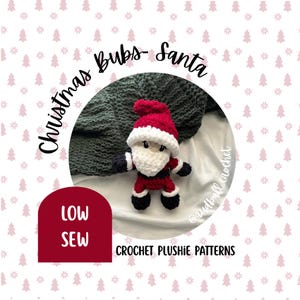 May include: A crocheted Santa Claus plushie with a red hat and suit, white beard, and black boots and gloves. The image includes the text "Christmas Bubs-Santa" and "LOW SEW CROCHET PLUSHIE PATTERNS".
