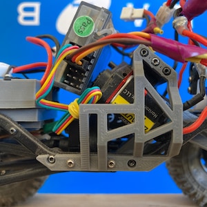Scx24 jeep, dual transmission ,clipless battery relocation ,high clearance rear links ,stock chassis