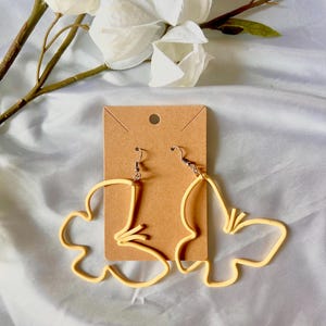 Handmade yellow butterfly earrings, polymer clay earrings, line drawing earrings
