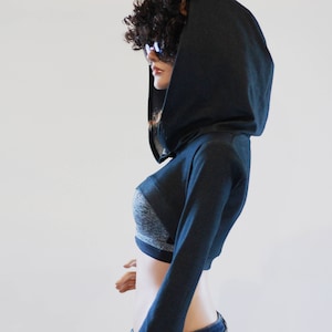 Oversized bolero met capuchon en klokmouwen