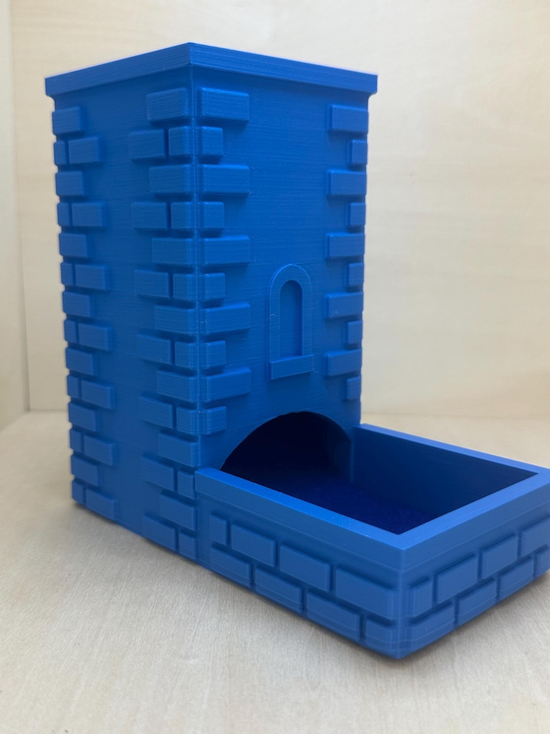 Front view of blue dice tower.