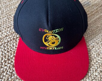 Like new Evolution Whistler cap Navy Red Brim Snapback