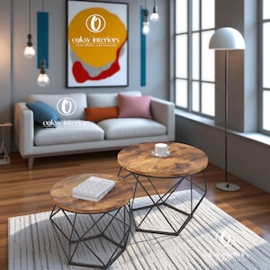 May include: Two round coffee tables with wooden tops and black metal geometric bases. They sit on a light rug in front of a white sofa with colourful cushions. A floor lamp and artwork are also visible. The artwork has the text "oaksy interiors".