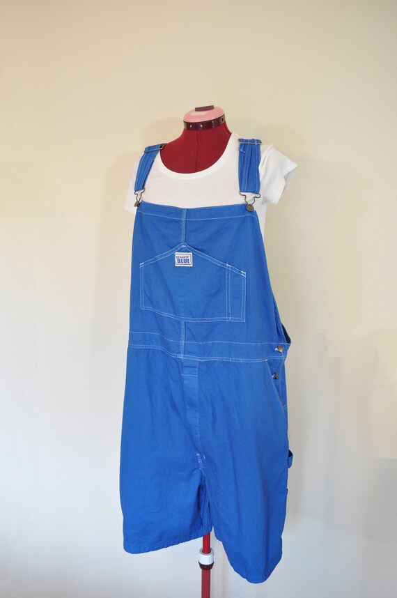 bright blue overalls