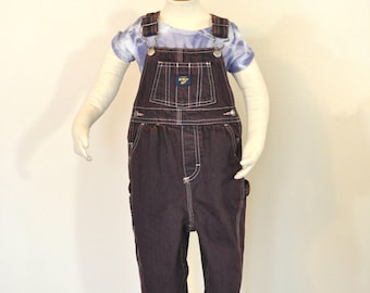 Pantalon salopette en denim recyclé OshKosh pour enfant de 18 mois teint en brun (22 l x 9 l)