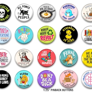 May include: A collection of twenty circular 3.175 cm pinback buttons featuring various colourful graphic illustrations and text slogans including Capitalism Is A Death Cult, Feminism For Everyone, and Good People Disobey Bad Laws on diverse backgrounds.