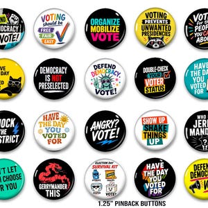 May include: A collection of 1.25-inch pinback buttons with various political messages. The buttons feature bold text and graphics, including phrases like "Defend Democracy," "Vote," and "Organize." Colors include black, white, yellow, pink, and blue. The buttons are designed to promote civic engagement.