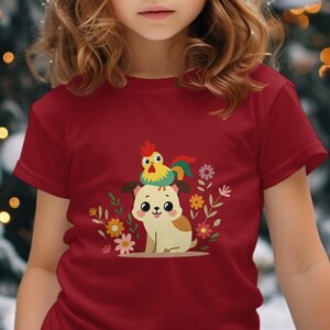 Cute Cat and Colorful Rooster Graphic, Fun Animal Design Tee, Cartoon Pet Lover Shirt, Adorable Kitten with Bird Artwork On T-Shirt