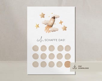Puede incluir: Una tarjeta blanca con una ilustración de un cohete y estrellas. La tarjeta tiene una cuadrícula de 16 círculos y el texto "ich schaffe das!" en negro.