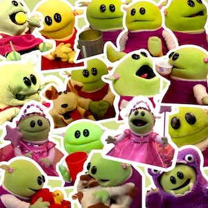 May include: A collage of green and yellow alien puppets with three eyes. The puppets are wearing pink dresses and are holding various props, including a can, a teacup, a wand, and a toy dog.