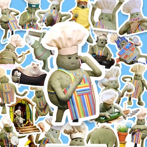 May include: A collage of green, felt-like figures dressed as chefs, each wearing a white chef's hat and a colorful striped apron. Some figures are holding objects like a phone, a video game controller, or a musical instrument. The background is a light blue color.