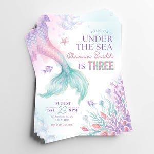 Stack of printed under the sea 3rd birthday invitations featuring watercolor mermaid tail artwork, pastel ocean animals, coral, starfish, bubbles, and purple third birthday lettering.