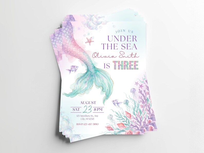 Stack of printed under the sea 3rd birthday invitations featuring watercolor mermaid tail artwork, pastel ocean animals, coral, starfish, bubbles, and purple third birthday lettering.