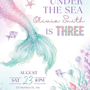 Mermaid 3rd birthday invitation close-up with watercolor mermaid tail, pastel purple and teal ocean colors, fish, jellyfish, coral, seashells, bubbles, and editable party information.
