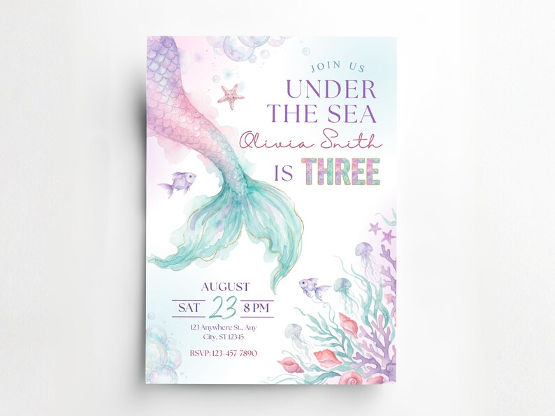 Printable mermaid birthday invitation mockup featuring a pastel watercolor mermaid tail, under the sea wording, fish, jellyfish, coral, seashells, and editable Canva birthday details.