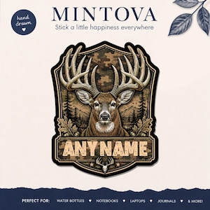 May include: A die-cut sticker featuring a detailed illustration of a deer with large antlers centred within a shield-shaped frame. The background displays a camouflage pattern, forest, and mountains. The text ANY NAME appears in a banner below.