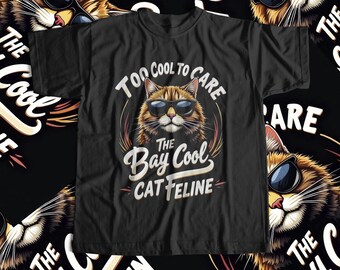 May include: A black t-shirt featuring a graphic of a cat wearing sunglasses and the text "Too Cool To Care The Bay Cool Cat Teline".
