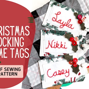 May include: Christmas stocking name tags made from white fabric, featuring red embroidered names, holly details, and red buttons. The tags are decorated with green sprigs and have white string loops. The image also includes the text "CHRISTMAS STOCKING NAME TAGS" and "PDF SEWING PATTERN".