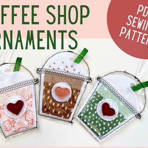 May include: Three felt coffee cup ornaments with a heart and a straw. The cups are pink, brown, and green. The ornaments are for sewing and are available as a PDF pattern.