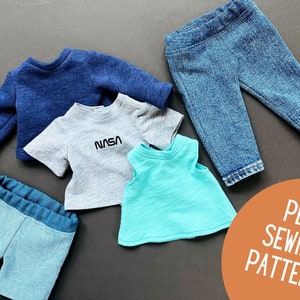 Könnte beinhalten: Ein PDF-Schnittmuster zum Nähen von Puppenkleidung. Das Schnittmuster enthält Anleitungen zum Nähen eines blauen Langarmshirts, eines grauen T-Shirts mit dem Wort "NASA" darauf, eines türkisfarbenen ärmellosen Shirts und zwei Paar blauer Jeans-Shorts.