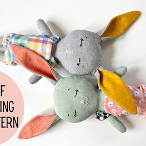 May include: PDF sewing pattern for two plush bunny toys. One bunny is gray with yellow ears and wearing a plaid outfit. The other bunny is green with orange ears and wearing a pink floral outfit.  The pattern includes instructions for making the bunny toys.