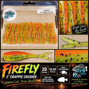 May include: A pack of 20 Firefly 2" Crappie Crusher fishing lures. These soft plastic baits feature a segmented body with a split tail, colored in a gradient of neon yellow and orange with black and purple glitter flecks throughout the material.