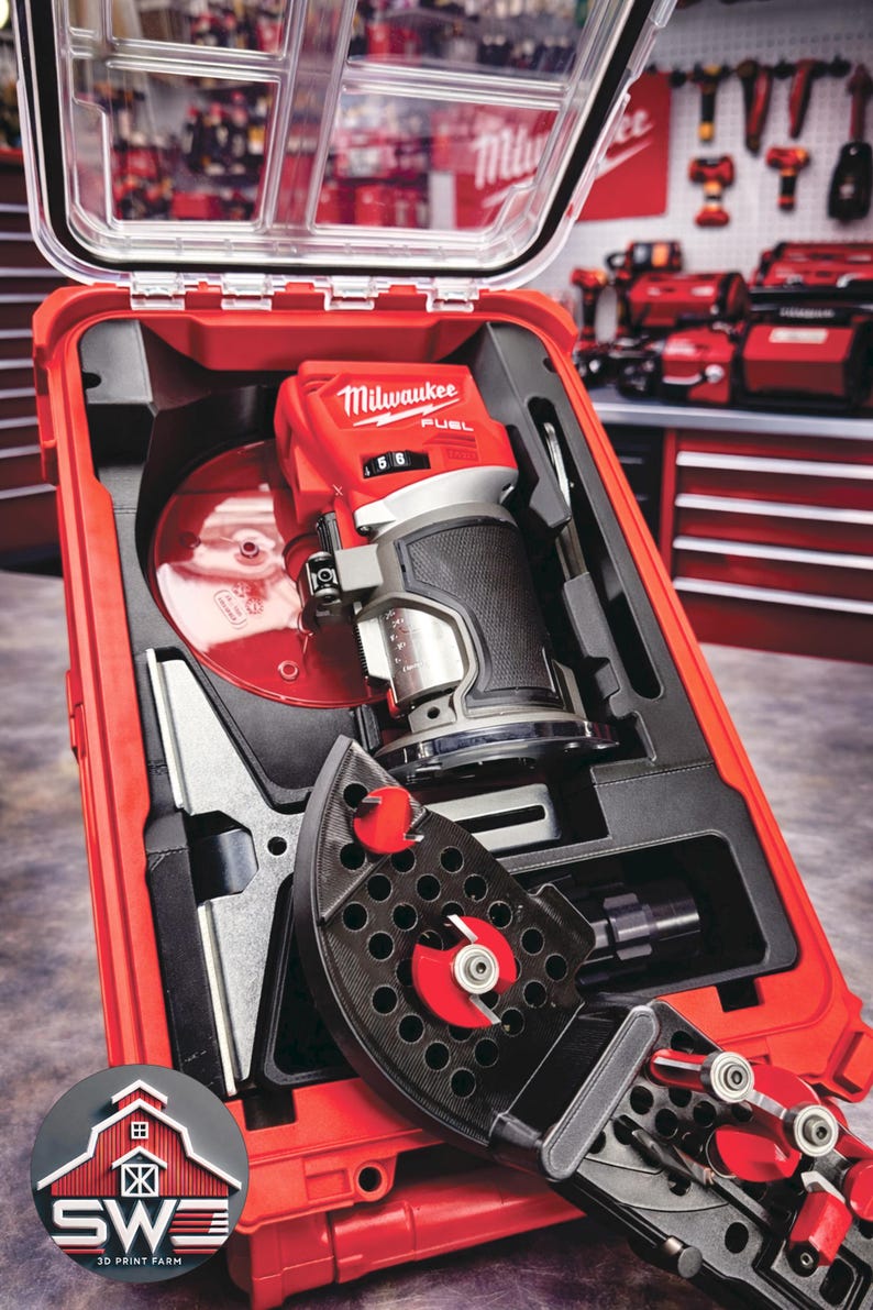 May include: A red Milwaukee FUEL router kit in a red case. The kit includes a router, various attachments, and accessories. The case is open, revealing the tools neatly organized within. The background shows a workshop setting with other tools.