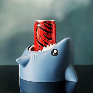 Shark Bite dryckeshållare – Det sötaste sättet att skydda din dryck!