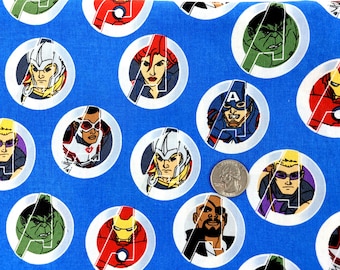 May include: Blue fabric with a repeating pattern of white circles containing images of various Avengers characters. The characters include Iron Man, Captain America, Thor, Hulk, Black Widow, Hawkeye, and Falcon. The fabric is perfect for quilting, sewing, and crafting.