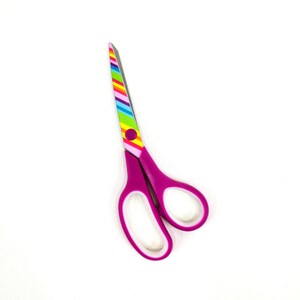 May include: A pair of pink scissors with a rainbow striped handle.
